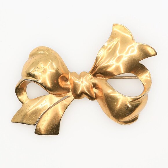 Vintage Monet Sterling Silver Yellow Gold Vermeil Stylized Bow Brooch 1940s - Picture 1 of 4
